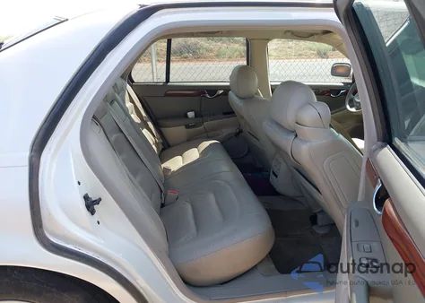 2003 Cadillac Deville Standard z USA, uszkodzony, nr VIN 1G6KD54Y73U173380